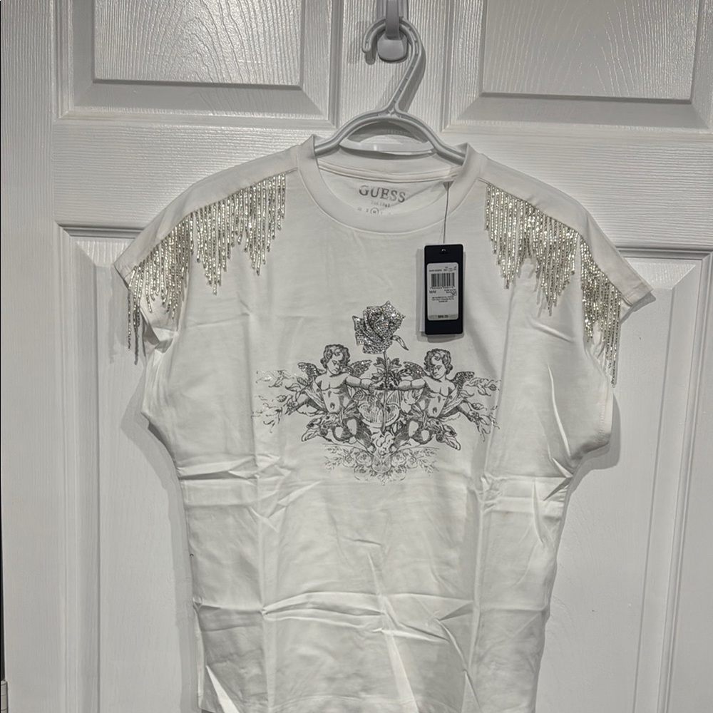 White Guess Sleeveless Top
NWT
Size Medium